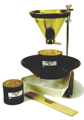 Fig. 1. A standard filling hopper and stand for the accurate filling of quart or pint cups for grain test weight determination. (Image: www.seedburo.com).